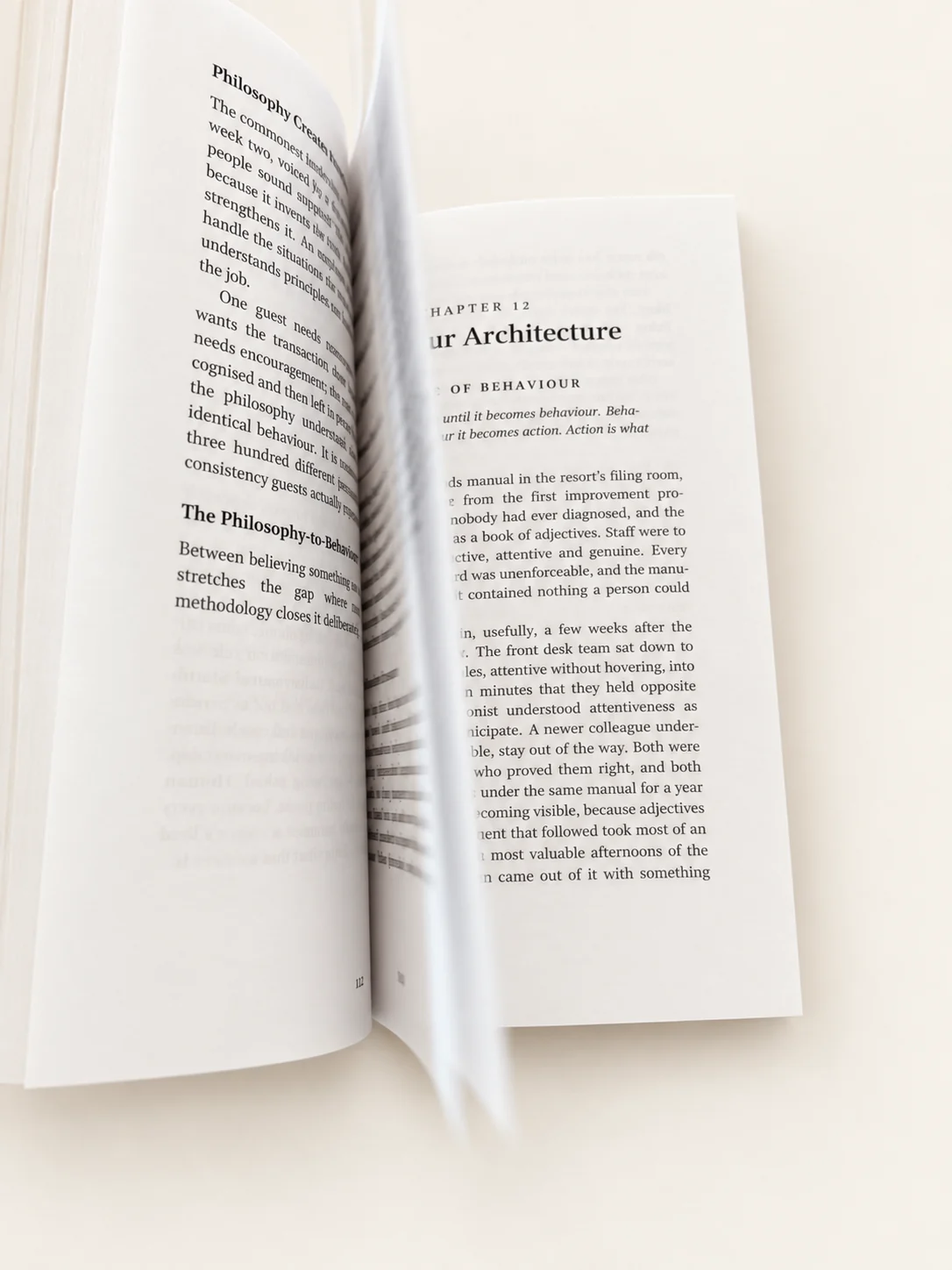 An open copy of The 26 Laws, ready to read and discuss